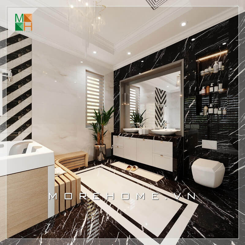 Sử dụng gạch lát nền màu đen và gạch ốp tường vân đá, sự kết hợp hài hòa giữa hai màu khiến căn phòng tắm trở nên sáng và rất sang trọng. Thiết kế phòng tắm nhà phố
