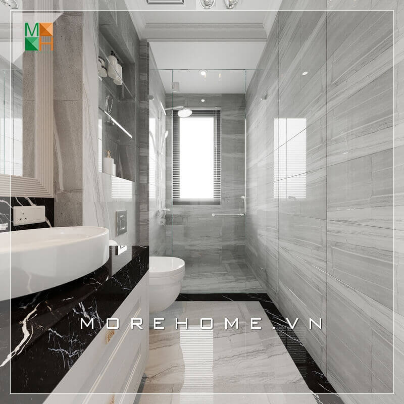Ngoài ra thiết kế còn sửa dụng kính làm vách ngăn thông minh giữa nhà tắm với WC rất hiện đại. Thiết kế phòng tắm nhà phố