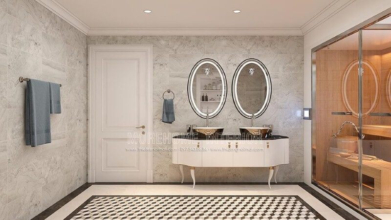 Tủ sơn trắng kết hợp cùng tay nắm mạ vàng tạo điểm nhấn ấn tượng cho phòng tắm tân cổ điển cao cấp.