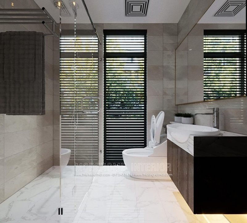 Đá ốp phòng vệ sinh và phòng tắm được làm từ chất liệu cao cấp với màu trắng vân mây.